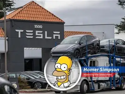 Tesla's stock takes a tumble, resembling Homer after a nuclear mishap.