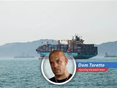 The Alliance Fairfax, a U.S.-flagged Maersk ship, transits the Strait of Hormuz under U.S. Navy escort, a testament to the ongoing volatility in the region.