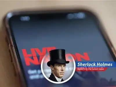 The iconic Ticketmaster logo looms over a concert crowd, symbolizing the company's dominance and recent legal challenges.